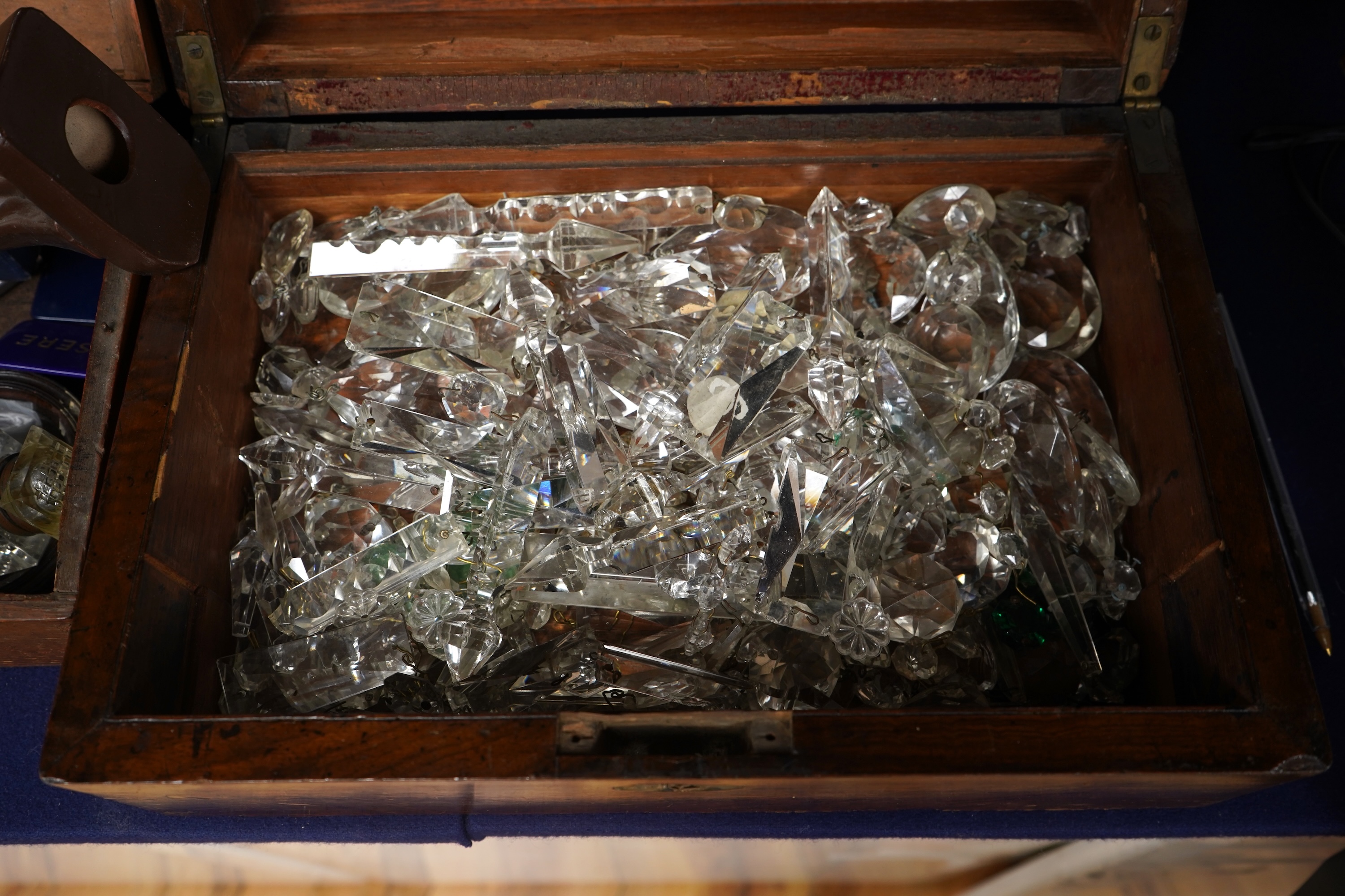 A box of cut glass drops, together with box of gaming counters, a gilt metal cross, an Art Deco ceramic nude figure, two frames, a parker pen, etc.